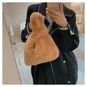 Fluffy faux fur handbag detail showing soft texture and trendy design for women fashion.