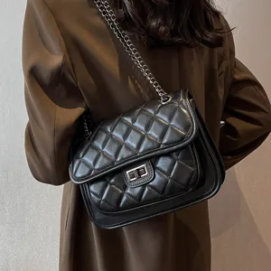 Women black quilted chain shoulder bag, stylish commuter crossbody small square bag for daily use.