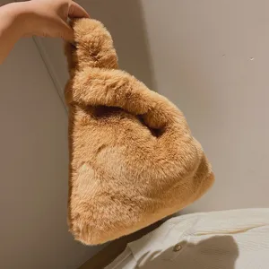Fluffy faux fur handbag for women, soft plush slouchy tote bag, cute winter shoulder bag.