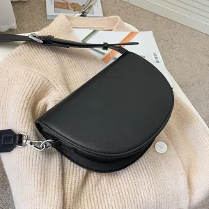 Stylish black half-moon shoulder bag for women, trendy wide strap saddle bag, casual autumn purse.