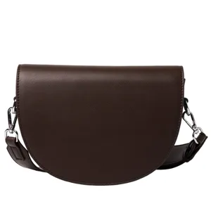 Fashion brown leather saddle bag for women, chic wide strap crossbody shoulder purse daily use.