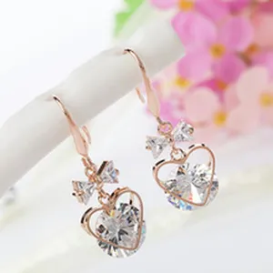 Chic rose gold zircon drop earrings featuring sparkling heart and bow details for women style.