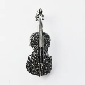 Elegant rhinestone violin brooch pin, vintage dark silver alloy musical jewelry accessory.