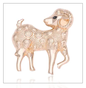 Gold-colored metal ram sheep brooch pin fashion animal corsage accessories for men and women.