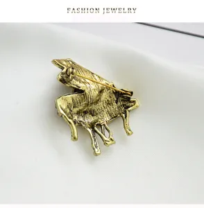 Detailed view of the vintage alloy piano brooch back pin, showing fine craftsmanship.