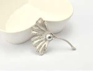 Ginkgo leaf pearl brooch detail, silver rhinestone crystal design, elegant jewelry accessory.