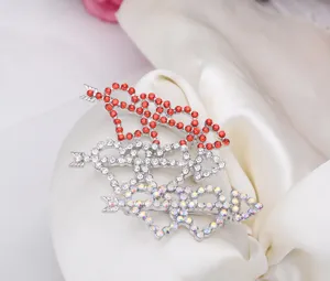 Elegant alloy rhinestone double heart arrow brooch detail view, sparkling crystal fashion pin acc.
