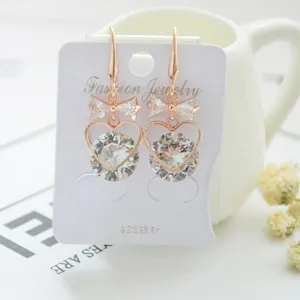 Elegant rose gold bow heart crystal drop earrings with 925 silver needle, fashion style.