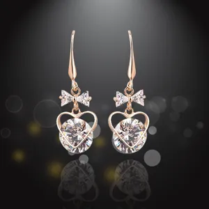 Fashion long rose gold zircon drop earrings with bow and heart design for women main view.