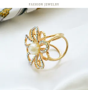 Gold zinc alloy rhinestone pearl scarf ring, elegant accessory for women fashion.