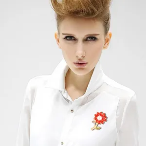 Elegant red carnation brooch with pearl center, stylish fashion accessory for women clothing.