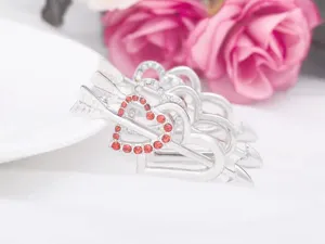 Detailed view of rhinestone heart arrow brooch, perfect Valentine jewelry accessory.