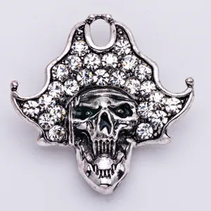 Alloy rhinestone pirate skull brooch pin, gothic style halloween fashion jewelry accessory.