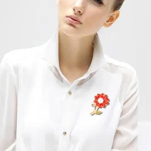 Elegant enamel carnation brooch with pearl accent for women fashion clothing decoration.