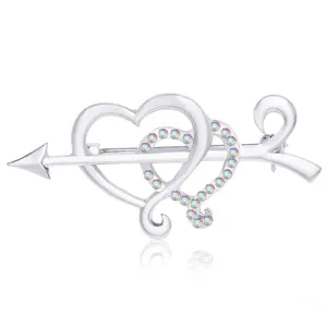 Detailed shot of silver tone double heart arrow brooch with crystal rhinestones for women.