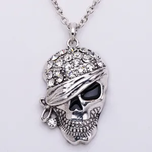 Silver skull pendant necklace punk style with sparkling rhinestones for men and women daily wear.