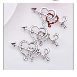 Stunning rhinestone arrow through double heart brooch pin for elegant women daily wear.