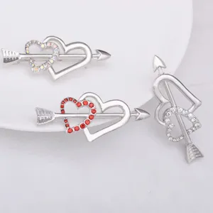 Alloy crystal double heart arrow brooch, elegant silver tone decorative clothing jewelry.