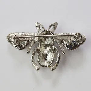 Detailed reverse view of the silver alloy bee brooch, showing pin and clasp mechanism clearly.