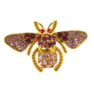 Cute crystal bee brooch pin, gold tone alloy fashion clothing jewelry accessory for women.