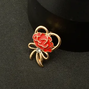 Close-up of red carnation rhinestone brooch, exquisite zinc alloy metal details for women.