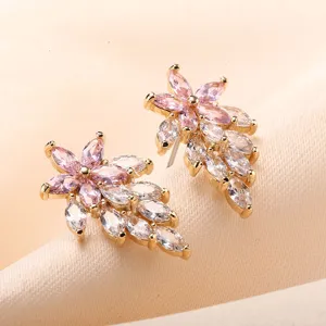 Elegant cubic zirconia flower stud earrings, brilliant marquise cut stones, gold plated shine.