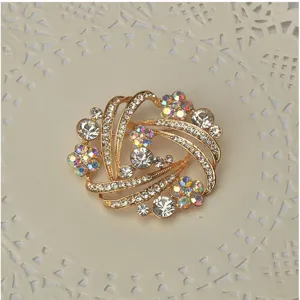 Gold rhinestone brooch pin, sparkling crystal flower design, elegant fashion jewelry for women.