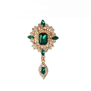 Vintage emerald crystal rhinestone brooch gold metal corsage women jewelry gift main view