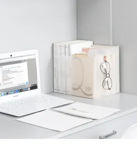 Transparent plastic desktop book storage box organizer detail scene showcasing neat arrangement.