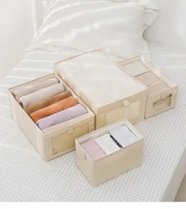 Organizzatore pieghevole per armadio per vestiti, pantaloni e scatola portaoggetti.