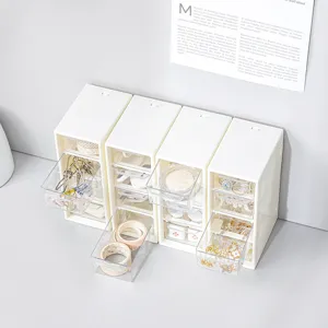 Bureau opbergdoos met doorzichtige schuifladen voor briefpapier en kleine kantoorartikelen.