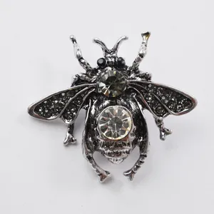 Vintage silver tone rhinestone insect brooch crystal bug lapel pin for women fashion.