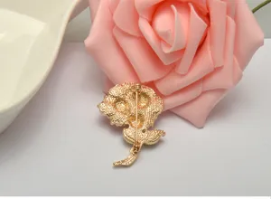 Detailed view of a gold-plated alloy carnation brooch back with secure pin clasp.