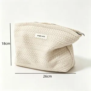 Beige woven cosmetic bag with zipper, portable makeup storage bag for daily use, 26x18cm