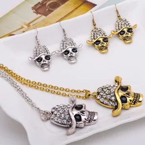 Punk gothic skull necklace and earrings set featuring rhinestone cowboy hat design.
