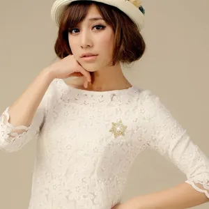 Elegant crystal snowflake brooch pin for women, sparkling rhinestone winter fashion jewelry.