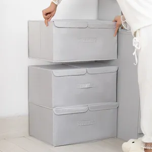 Grande scatola di immagazzinaggio pieghevole in tessuto oxford grigio con doppio coperchio.
