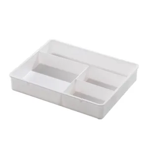Scatola organizer per cassetti in plastica bianca con scomparti multipli per scrivania e cosmetici.