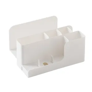 Multifunctional desktop storage box and phone stand, white plastic organizer for home.