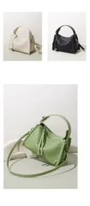 Sac à bandoulière classique en cuir tissé avec poignée et sangle réglable en plusieurs coloris.