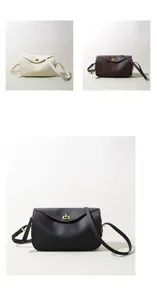 Sac bandoulière minimaliste en cuir, élégant sac porté épaule avec fermeture métallique.