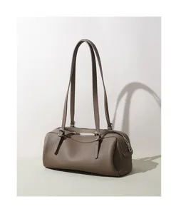 Elegante Schultertasche aus echtem Leder für Damen, retro Pendler Bowlingtasche mit Riemen.