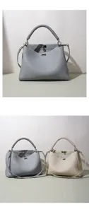 Detalles del bolso de cuero de lujo, elegante bolso tote y bandolera con cierre de giro.