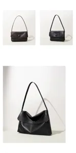 Detail view of minimalist genuine leather shoulder handbag with elegant flap and single button.
