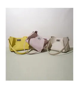 Chic bucket bag for women, minimalist design crossbody shoulder handbag, stylish spring purse.