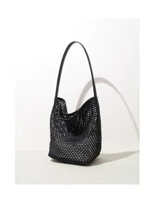 Black woven leather hobo shoulder bag detailed shot, elegant open-weave bucket bag design.