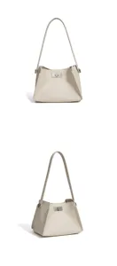 Minimalist leather bucket shoulder bag detail, elegant casual design for modern daily commuting.