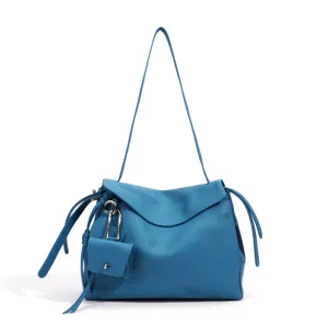 Blue genuine leather shoulder bag for women, stylish flap crossbody bag with metal lock.