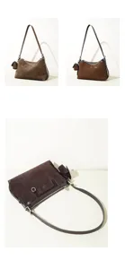 Brown suede shoulder bag detail view, featuring retro metal ring buckle and smooth zipper.