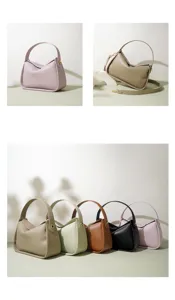 Modisch bolso de hombro minimalista de cuero con asa superior y diseño de cruasán.